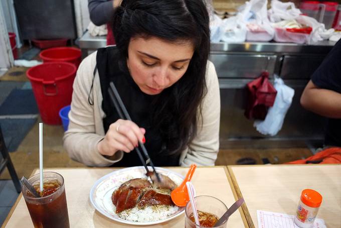 girl eating roast goose