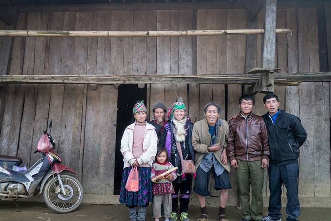 Ker and family outside their home