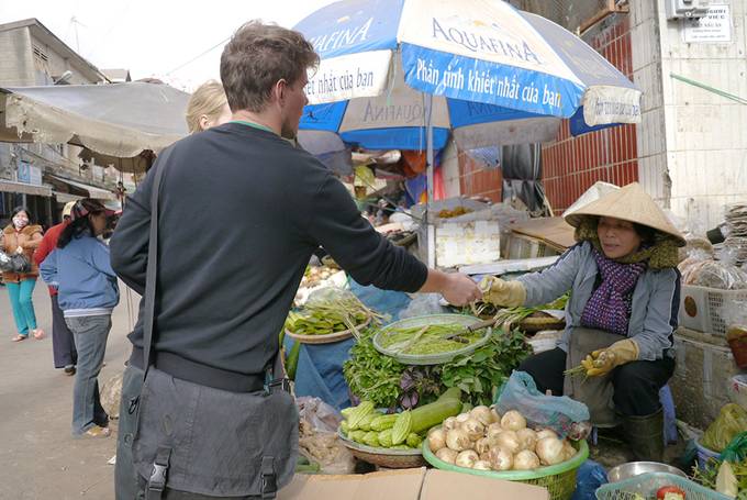 Colin buying vegetables